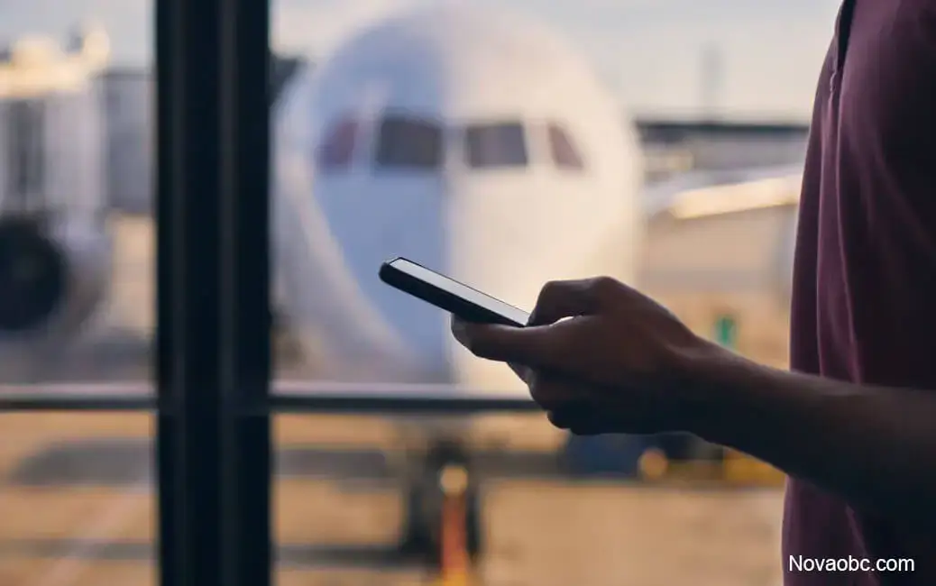 Onboard courier holding luggage at the airport, ready for urgent delivery