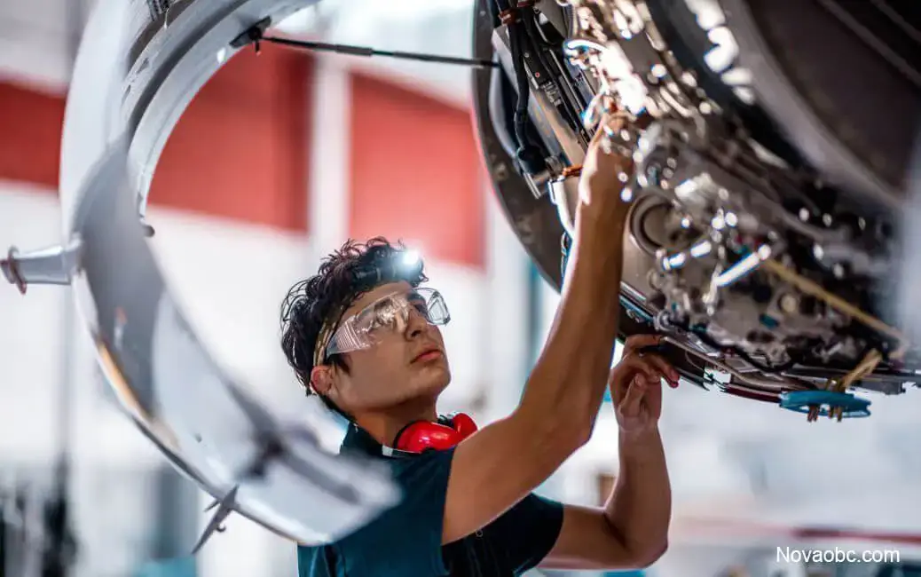Aircraft engine undergoing maintenance inside an aviation hangar
