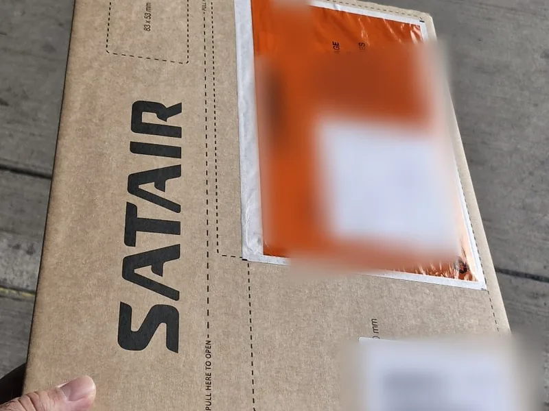 AOG-labelled carton with shipping documents ready for hand-carry